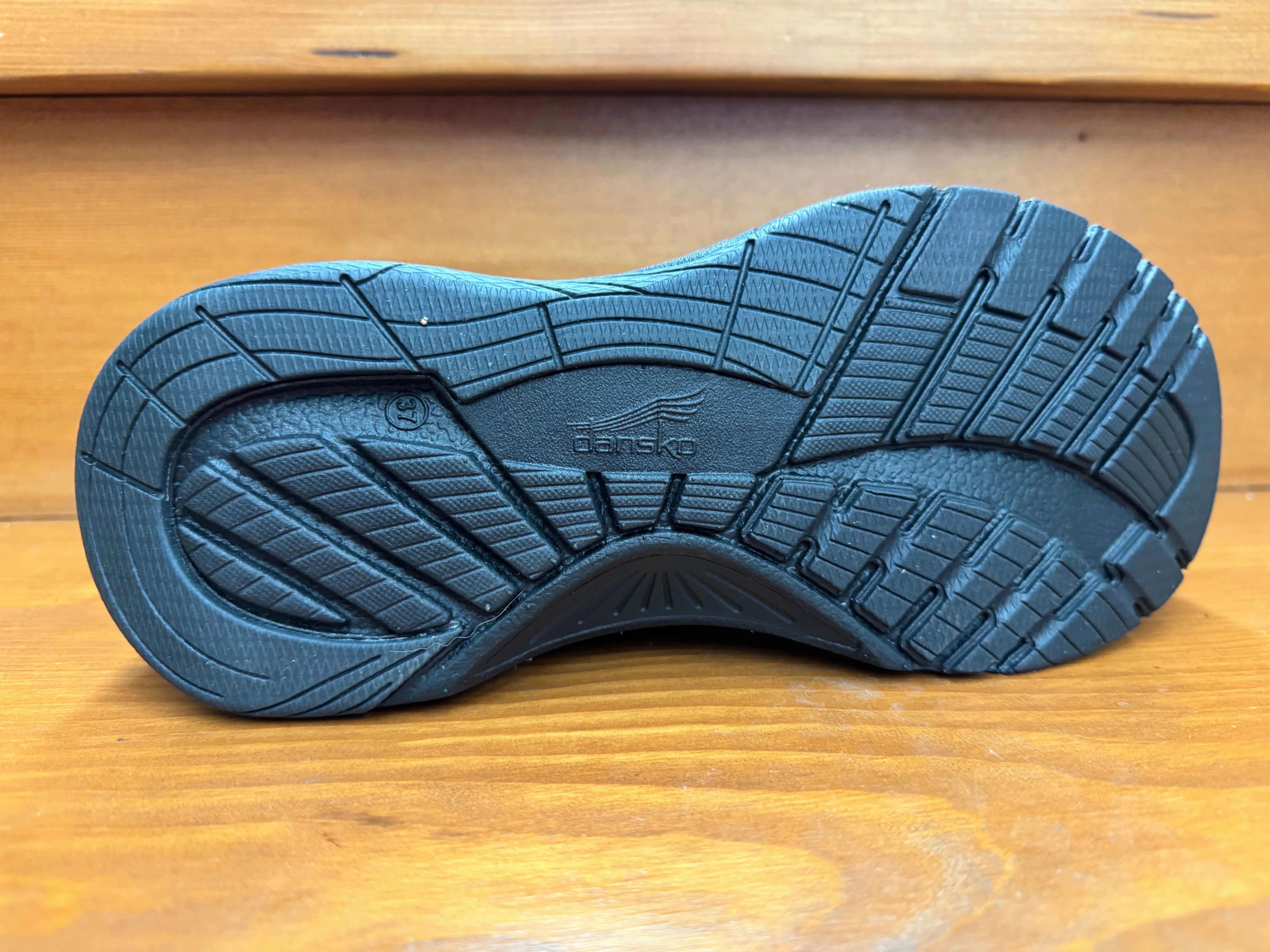 Dansko Pep Black Knit Buckle Closure dirt material