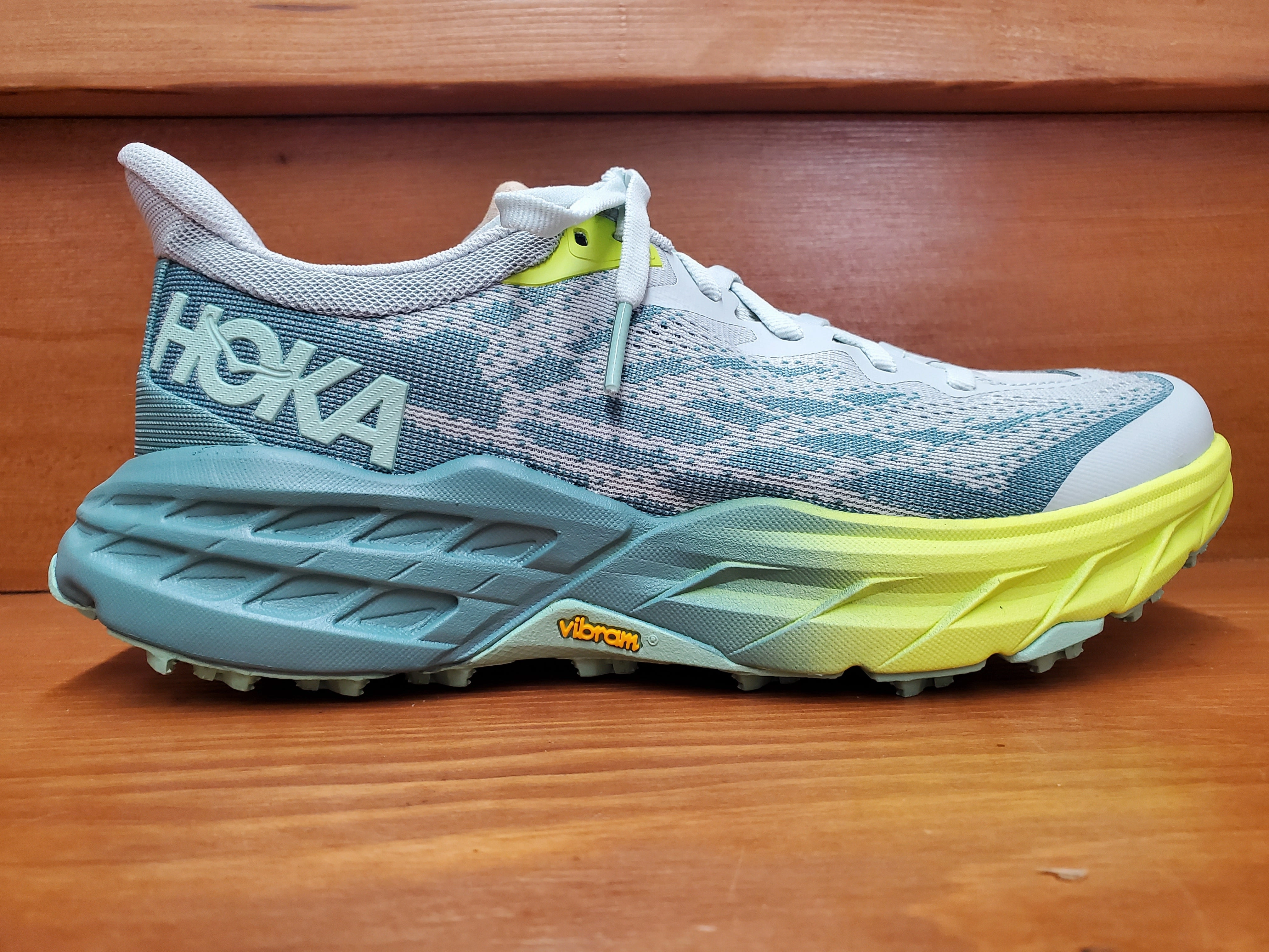 Hoka Speedgoat 5 Mercury/Trellis 1123158 MTLL running in a coastal area walkers