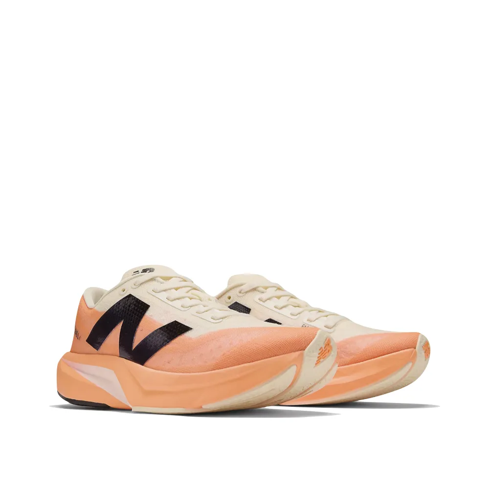 New Balance 993 Joe Fresh Goods New Balance Women's FuelCell Rebel v4 Sneaker in Hot Mango/Angora/Black