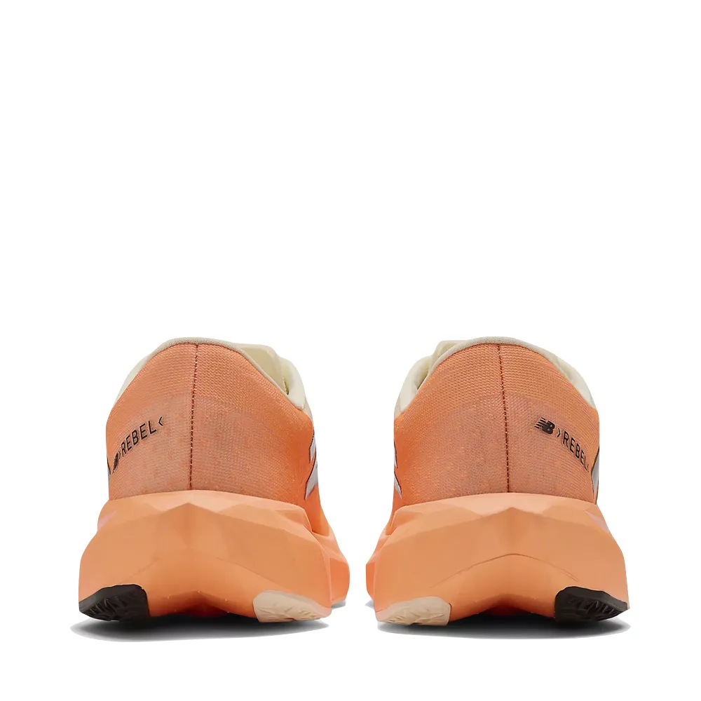 Tiago Lemos New Balance New Balance Women's FuelCell Rebel v4 Sneaker in Hot Mango/Angora/Black