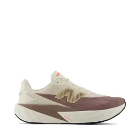 New Balance 2002r Light Blue New Balance Men's FuelCell Rebel v5 Sneaker in Angora with Earth Shadow and Sea Salt