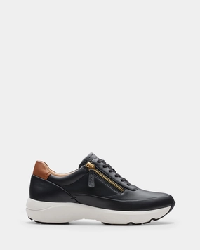 Tivoli Zip Black Leather running in a stone bridge area shoes